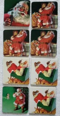 6 or 8 Vtg Coca Cola Christmas Coasters Santa Painter Relaxing Cardboard Cork - Image 1 of 4