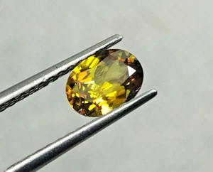 1.20 Cts Sphene/Titanite Oval Vibrant Color 100% Natural With Nice Dispersions - Picture 1 of 6
