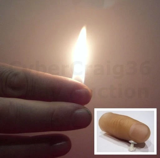 FLAMING THUMB TIP FIRE STAGE STREET FLAME MAGIC TRICK THUMBTIP LIGHT CLOSE UP - Image 1 of 1