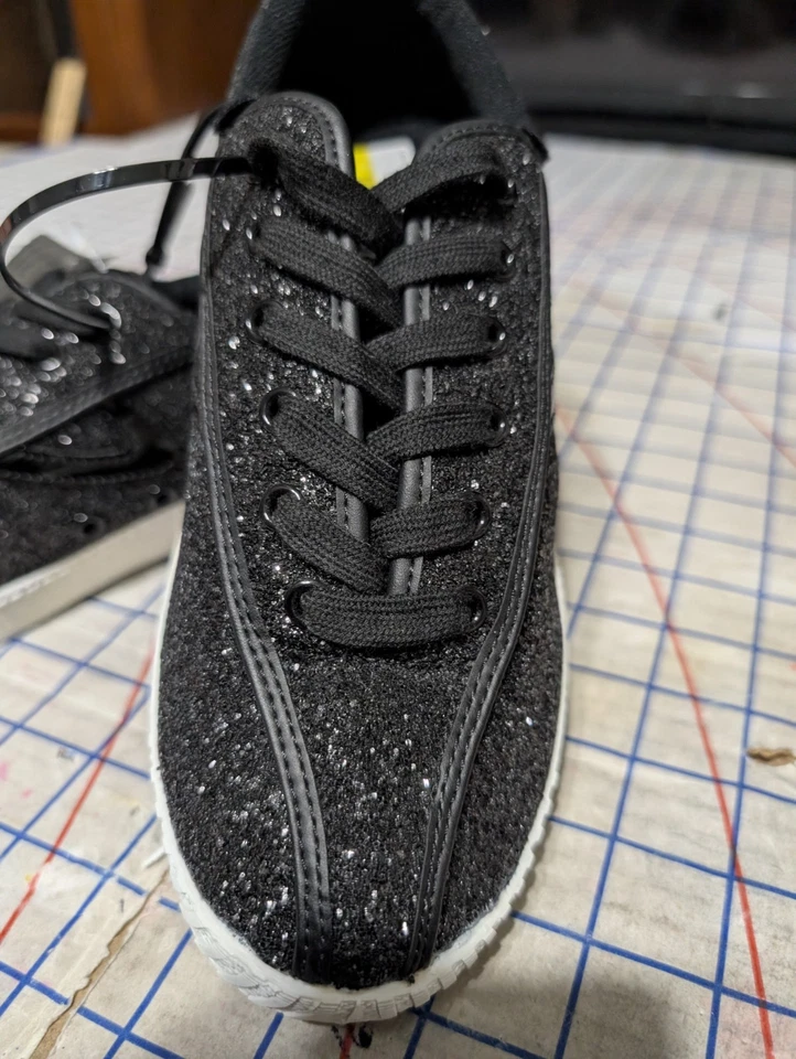 Zapatillas negras brillo Foto 1 de 4