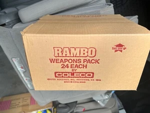 Estuche completo sellado 1986 Coleco Rambo Weapons Pack - Estuche completo de 24 - Imagen 1 de 5