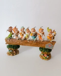 ♥ DISNEY TRADITIONS DESIGN JIM SHORE HOMEWARD BOUND I SETTE NANI STATUINA - Foto 1 di 3