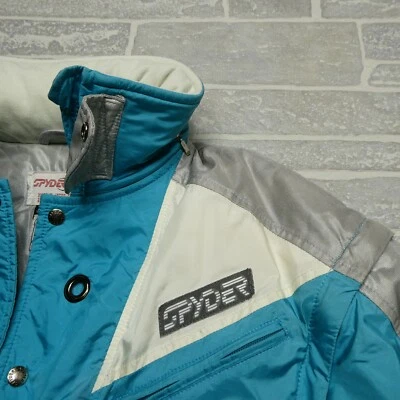 Chaqueta de esquí Spyder Entrant de colección para hombre M azul mangas extraíbles capucha retráctil Foto 1 de 4