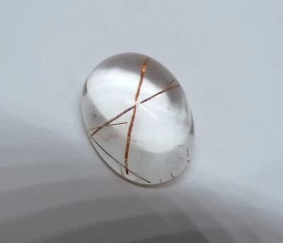 Gemma semipreziosa di Quarzo rutilato Taglio Cabochon 27 Carati Origine Brasile - Immagine 1 di 4