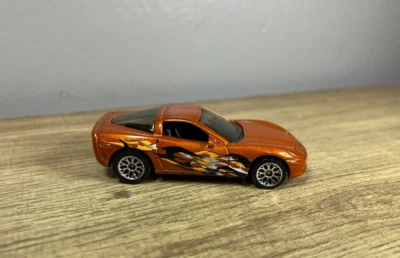 Matchbox '04 Chevy Corvette Coupe C6 - Orange w/Flames - 1:60 Scale Diecast Car - Image 1 of 4