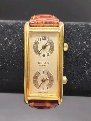 Reloj Pulsera Benrus Cuarzo Doble Zona Cara Dorada con Banda Marrón BN 326 138 PC11 Foto 1 de 4