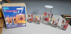 Vintage Peanuts Snoopy 5 Piece Juice Set 2 Pitchers & 4 Glasses Anchor Hocking - Picture 1 of 6