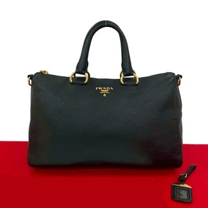 PRADA Logo Metall Handtasche Leder schwarz A4-10 - Bild 1 von 10