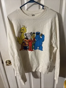 Kaws x Sesame Street Pullover Mens M Cream Elmo Cookie Monster Crewneck Uniqlo - Picture 1 of 4