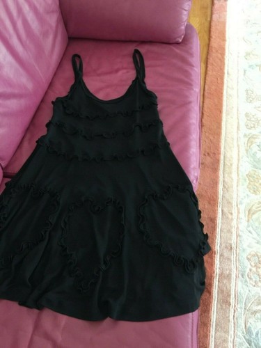 MOSCHINO NUOVISSIMO ABITO CORTO NERO CON CUORI TAGLIA 42. REG$1000 00