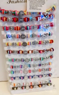 12 PULSERAS BAUTIZO RECUERDOS San Benito Elefante Mal de ojo mano Búho Foto 1 de 4