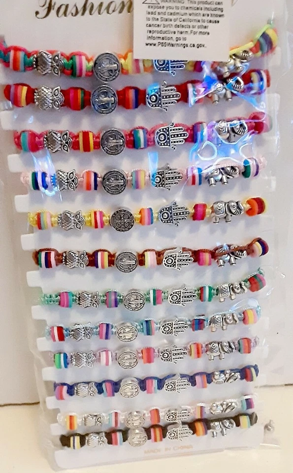 12 PULSERAS BAUTIZO RECUERDOS San Benito Elefante Mal de ojo mano Búho Foto 1 de 4