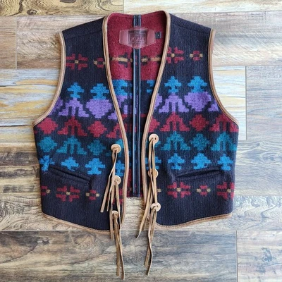 Chaleco para mujer vintage 80 Woolrich hecho en EE. UU. Azteca Suroeste lana cuero ribete L Foto 1 de 4