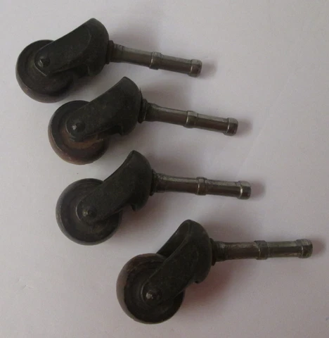 set of 4 antique wood & metal roller caster wheels for furniture restoration Cover
