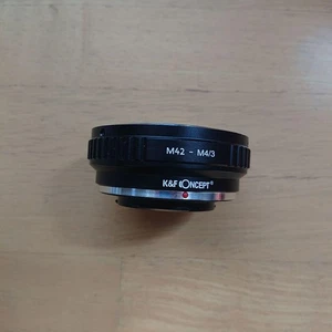 Adattatore obiettivo fotocamera da M42 a M4/3 usato condizioni luminose - Foto 1 di 4