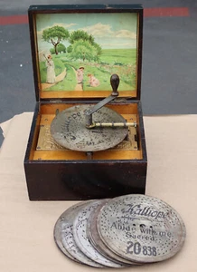 Antico carillon in legno Kalliope con manovella e 10 dischi dischi polifonico vittoriano - Foto 1 di 17