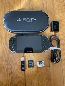 Sony PS Vita black PCH-1000 OLED with charging cable, 256gb sandisk extreme.