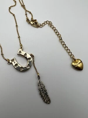 Betsy Johnson Necklace Feather & Horseshoe Pendent Heart Cutouts Gold Tone - Image 1 of 4