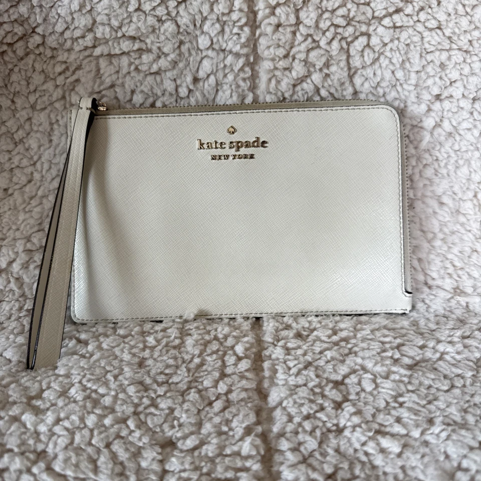 cartera pulsera kate spade Foto 1 de 4