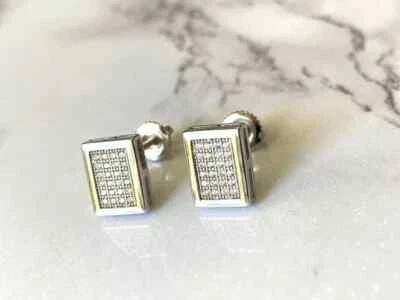 Aretes con bisel de diamantes de corte redondo de 1,00 quilates con acabado en oro blanco de 14 quilates Foto 1 de 4