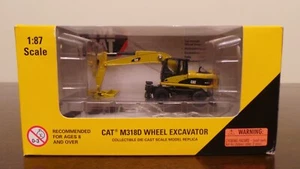 Norscot Cat M318D Wheel Excavator 55177 Collectible Die-Cast 1:87  - Picture 1 of 3