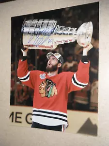 CHICAGO BLACKHAWKS BRANDON SAAD SIGNED HOLDING CUP 16X20 - Picture 1 of 1