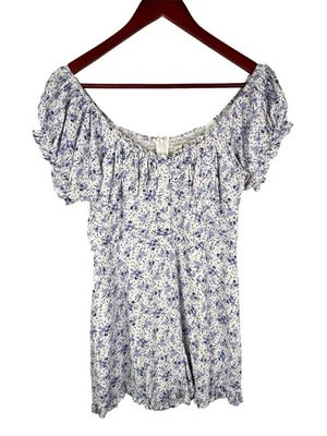Mameluco de mujer URBAN OUTFITTERS blanco azul floral con volantes manga corta mediano Foto 1 de 4