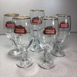 Lote de 5 vasos Stella Artois cáliz uno 40cl cuatro 33cl copa con borde dorado - Imagen 1 de 7