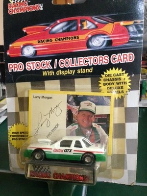 LARRY MORGAN "CASTROL GTX" 1/64 NHRA PRO STOCK DIE CAST IN YELLOWED PKG - Image 1 of 2