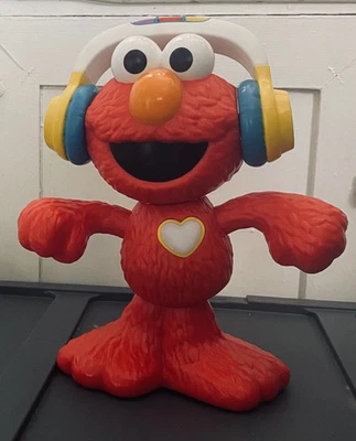 Auriculares musicales de Plaza Sésamo Elmo Let’s Dance canta charlas y bailes funciona Foto 1 de 4