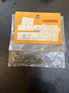 Kyosho Assault AB-6 Getriebebuchsen Vintage Neu in Verpackung - Bild 1 von 2