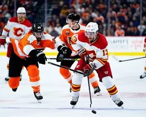 Johnny Gaudreau Skating Up Ice Calgary Flames 8x10 NHL Hockey Photo - Picture 1 of 1
