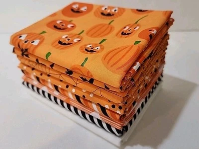 Quilting Cotton Fabric 1/2 yd. Bundle Too Cute to Spook, 8 prints Pumpkin Orange - Image 1 of 4