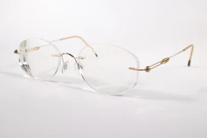 Monturas de gafas Silhouette para mujer doradas sin montura de titanio - Imagen 1 de 4