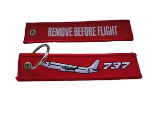 Schlüsselanhänger Remove before flight 737 ca 12,5x3, cm in weiß/rot - Picture 1 of 1