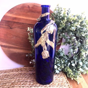 Vintage Cobalt Blue Ornate Glass Wine Bottle 11 '' Tall With Applied Metal Tulip - Picture 1 of 10