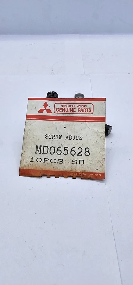 MD065628 Nuevo OEM Original Mitsubishi TORNILLO DE AJUSTE, BRAZO BASCULANTE Foto 1 de 4