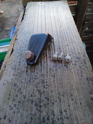 VW T2 BAY CAMPER '68 - '79.  SLIDING DOOR TOP ROLLER BRACKET - RHD (GENUINE VW) - Image 1 of 3