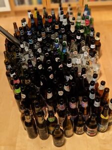 135 Empty Beer Bottles, brown, green and clear glass