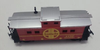 Life-Like HO Scale Santa Fe ATSF 949851 Caboose with Chimney, Missing Wheel - Image 1 of 3