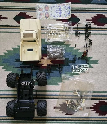 Vintage 1987 Tamiya Midnight Pumpkin RC Truck Parts - Image 1 of 4