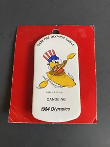 Vintage 1984 LOS ANGELES OLYMPICS' SAM THE OLYMPIC EAGLE Canoeing BUTTON/PIN - Picture 1 of 3