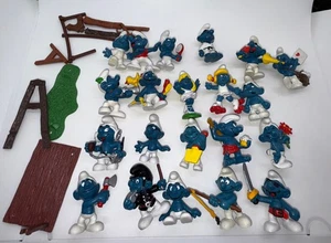 Lote de 21 Pitufos vintage con piezas diversas - Imagen 1 de 18