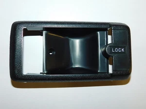 HOLDEN GEMINI TX TC TD TE TF TG SEDAN GENUINE NEW INTERIOR DOORLOCK SURROUND NOS - Picture 1 of 2