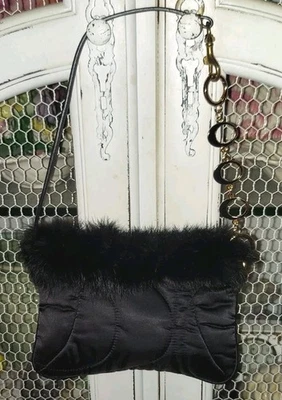 Mini bolso Coach acolchado negro con piel y extensión Foto 1 de 4