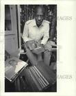 1986 Press Photo Harrison Dillard with record albums and compact discs