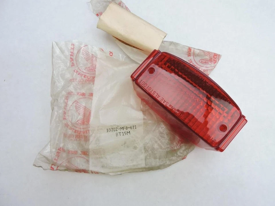 Lente de luz trasera OEM HONDA CH80 33702-MF8-671 Foto 1 de 1