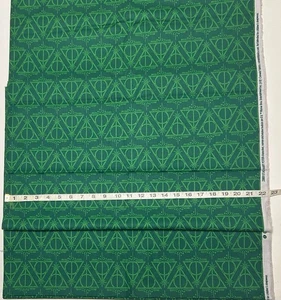 Harry Potter Fabric 100% Cotton Deathly Hallows on Green Background HALF YARD - Picture 1 of 3