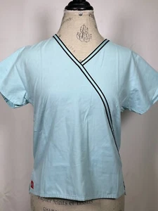 Blusa Médica Dickies Uniforme Multibolsillo Cuello en V Cian Para Mujer XS - Imagen 1 de 10