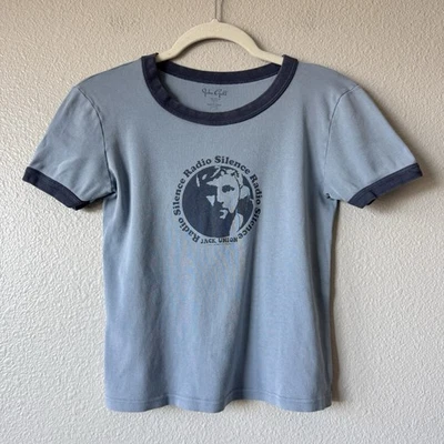 Camiseta Brandy Melville Radio Silencio Banda Bebé Talla Pequeña Estampado Gráfico Rock Punk Foto 1 de 4